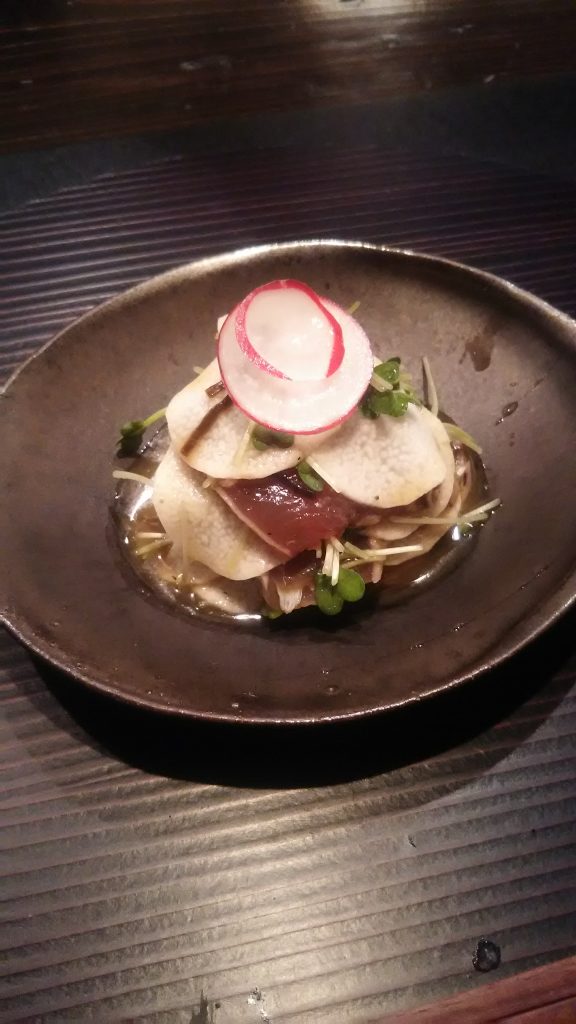 single radish on tuna stone plate