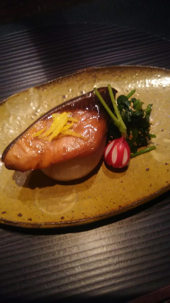 salmon with radish and greens stone plate